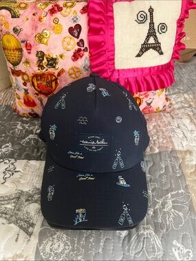 Travis Mathew Navy Cap with Light Blue & White Icons